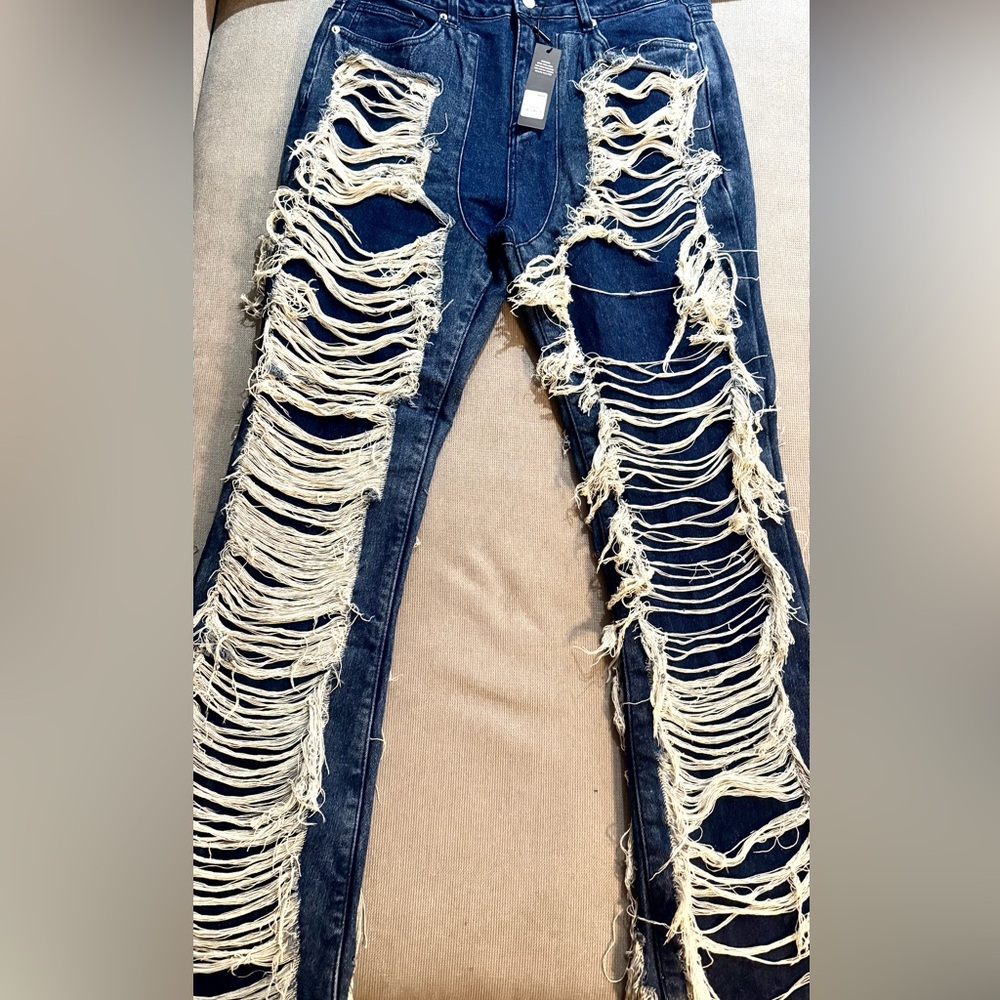 Shredded Boot Cut Blue Jeans